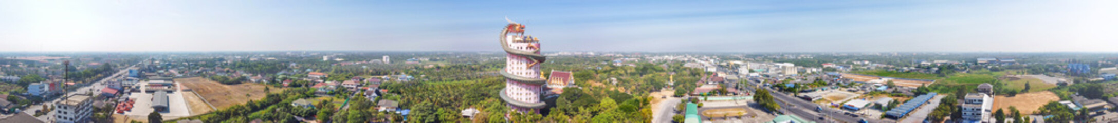 Fototapeta premium Wat Samphran Dragon Temple near Bangkok, Thailand. Aerial panoramic view from drone