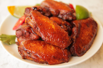  grilled chicken wings with lime and hot pepper.