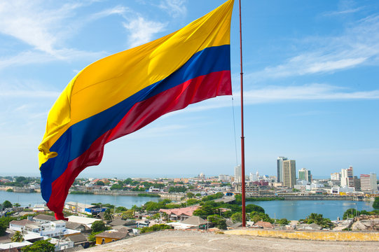 Cartagena, Bolivar, Colombia. January 18, 2013: Panoramic of Cartagena city and flag of Colombia. 