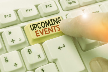Conceptual hand writing showing Upcoming Events. Concept meaning the approaching planned public or...