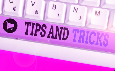 Writing note showing Tips And Tricks. Business concept for piece of inside facts specially in...