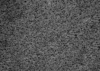 Gray pumice stone texture close up. Porous pumice background. - obrazy, fototapety, plakaty
