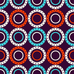 Seamless pattern with bright circular geometric shapes.