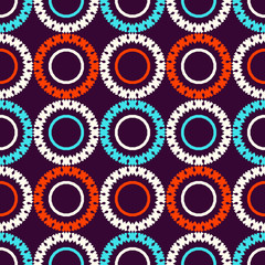 Seamless pattern with bright circular geometric shapes.