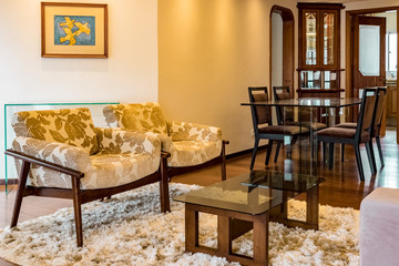 modern interior of a living room with table chairs sofa