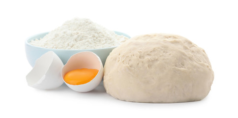 Fototapeta na wymiar Dough, egg and flour on white background. Cooking pastries