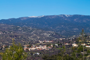 Fototapeta na wymiar View of mountains and village in winter