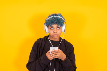isolated young girl with headphones and mobile phone