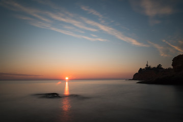 Fototapeta premium sunset on the beach with long exposure
