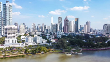 Fototapeta na wymiar Bangkok skyline, Thailand. Aerial view of city buildings from Benjakitti Park