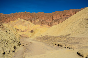 Fototapeta na wymiar Death Valley Junction, California - November 11, 2019: Golden Canyon Trailhead in Death Valley National Park in California, USA