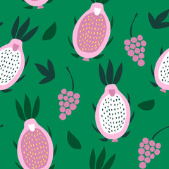 Seamless pattern of pink pitaya and grapes on a green background.