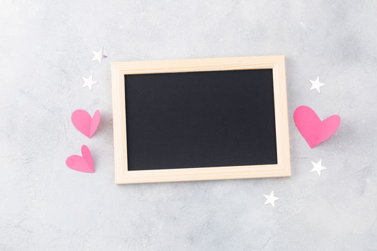 Frame for text and hearts on grey background. Happy Valentine day.
