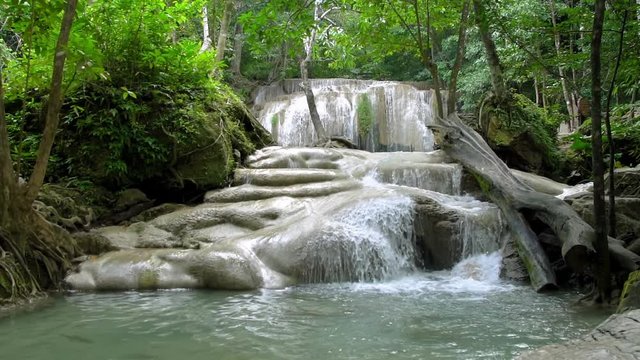Erawan waterfall level two in National Park, famous tourist destination in Kanchanaburi, Thailand - Slow motion
