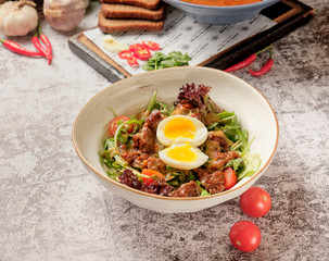 Leaf salad with poached egg and red meat. Dinner Idea. A healthy, delicious brunch.