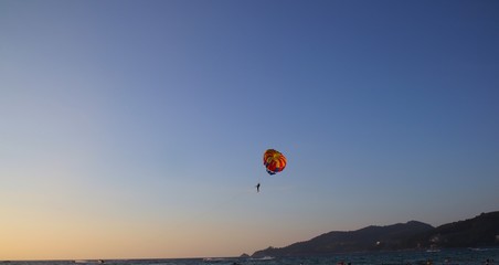 Parasailing at Patong Phuket Thailand at Sunset beautiful colours