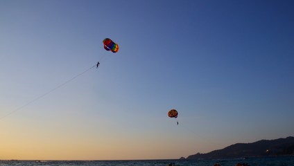 Parasailing at Patong Phuket Thailand at Sunset beautiful colours