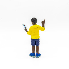 Isolated Disabled Young Black Deaf Boy Reading a Book. Good for Educational Purposes to Teach Children. Disability Toy Concept. Inclusive and Equal Opportunity Toy. - Photography
