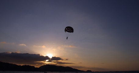 Parasailing at Patong Phuket Thailand at Sunset beautiful colours