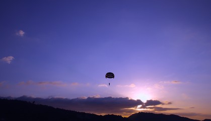 Parasailing at Patong Phuket Thailand at Sunset beautiful colours