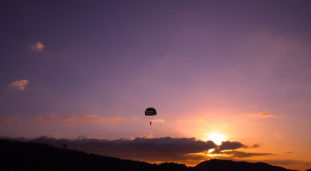 Parasailing at Patong Phuket Thailand at Sunset beautiful colours
