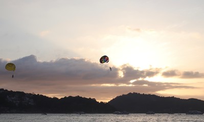 Parasailing at Patong Phuket Thailand at Sunset beautiful colours