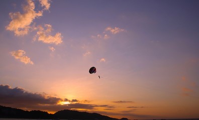 Parasailing at Patong Phuket Thailand at Sunset beautiful colours