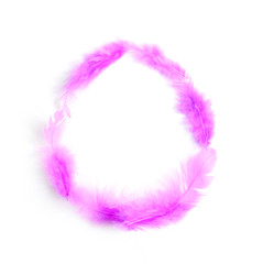 Purple feathers in the shape of an Easter egg, creative minimalist Easter background