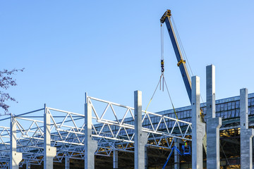 construction of the body of a modern factory, assembly of metal trusses