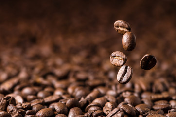 Brown Roasted Coffee Beans Falling on Pile