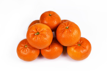 Pile of mandarin orange on white background