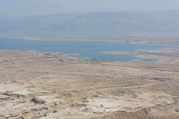 Panoramic view from the top of Masada on the Judaean Desert and the Dead Sea, in Israel.