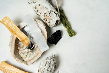 Smudge kit for spiritual practices with natural elements: Palo Santo sticks, dried white sage,...