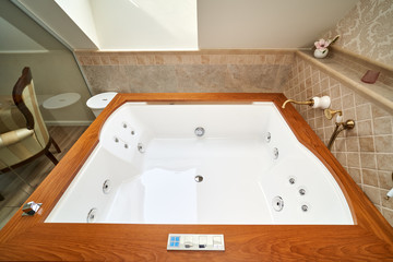 Jacuzzi bathtub in a hotel bathroom