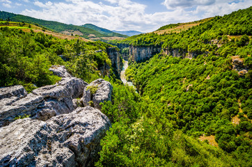 Canyon Osumi with blue water near Corovode, Alabnia in summer