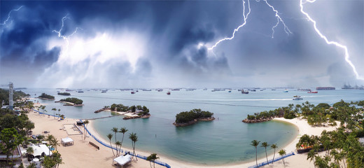 Sentosa, Singapore. Aerial panoramic view of Siloso Beach during a storm