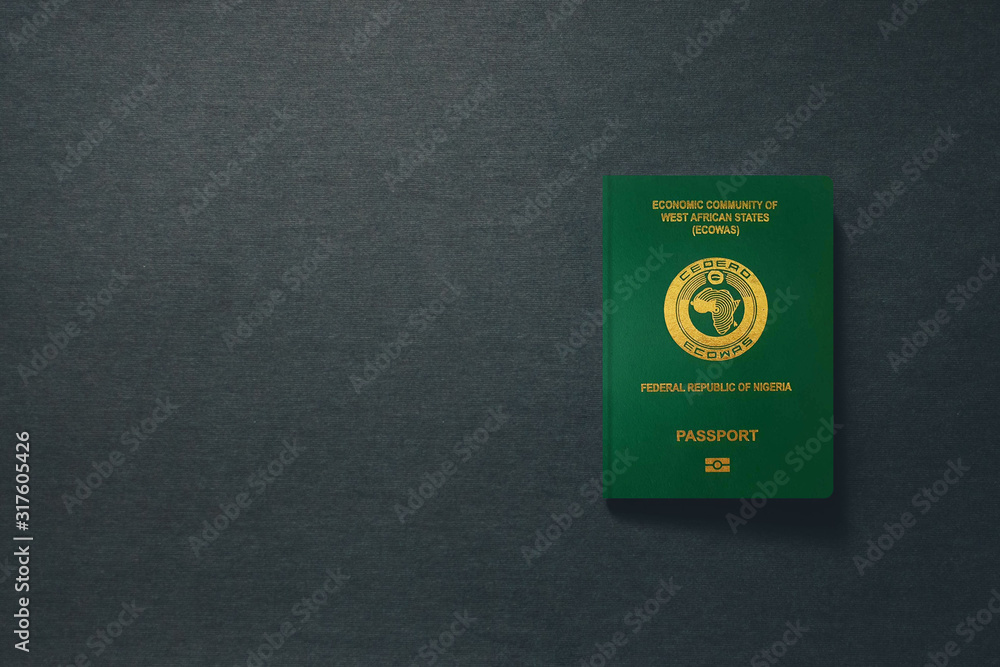 Wall mural nigeria passport on dark background with copy space - 3d illustration