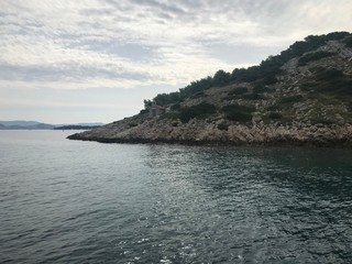 A beautiful island in Croatia against a cloudy sky