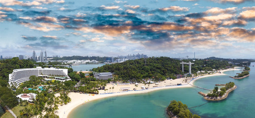 Panoramic aerial view of Siloso Beach and Sentosa Island at sunset, Singapore