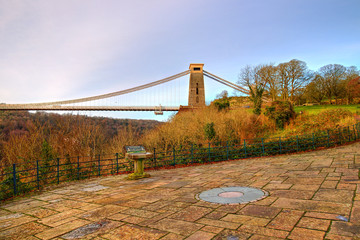 View in a winter sunset of the Clifton Suspension Bridge, a suspension bridge spanning the Avon Gorge and the River Avon in the city of Bristol, UK