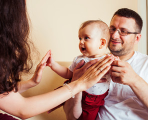 young happy modern family smiling together at home. lifestyle people concept, mother, father and...
