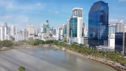 Fototapeta premium Bangkok skyline, Thailand. Aerial view of city buildings from Benjakitti Park