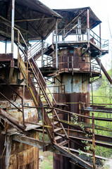 Rusty industrial towers of Liban Quarry, abandoned industrial location in Krakow, Poland