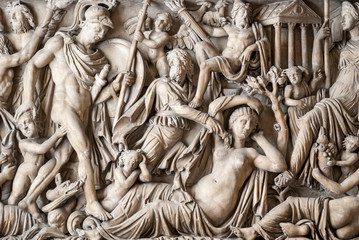 Italian Renaissance sculptural relief of metaphorical men and women draped in robes in Rome, Italy - obrazy, fototapety, plakaty