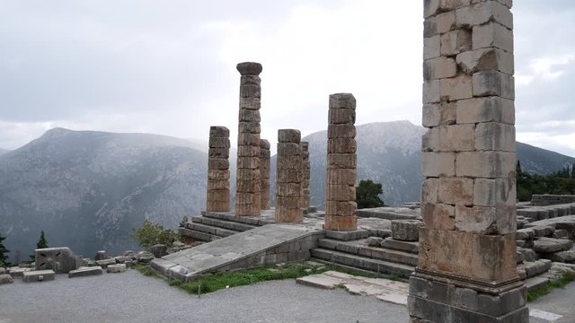 Ruins of the ancient temple of Apollo, archaeological site of Delphi along the slope of Mount Parnassus, UNESCO World Heritage, Greece.