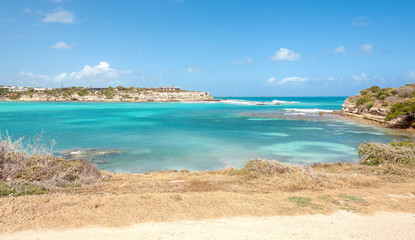 Fototapeta premium Devil's Bridge bay - Caribbean tropical sea - Antigua and Barbuda.