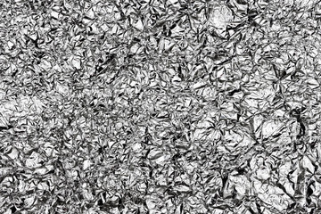Texture on the cooled down surface of melted tin. Surface of a liquid metal alloy made of steel...