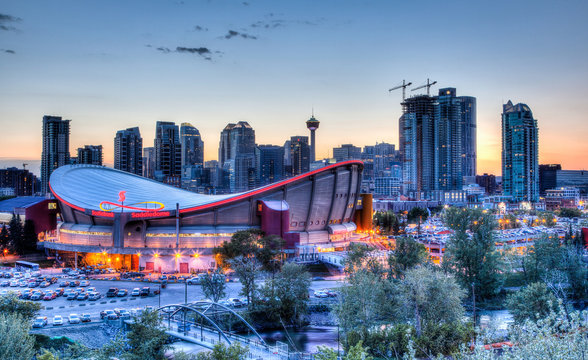 Scotiabank Saddledome And Sunset Over Downtown Calgary