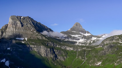 wide morning view of mt clements and reynolds mtn in glacier national park