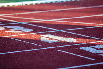 Red running sport track background and texture. Sport running track concept.